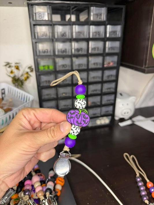 Glowin' Purple Pumpkin Pacifier Clip